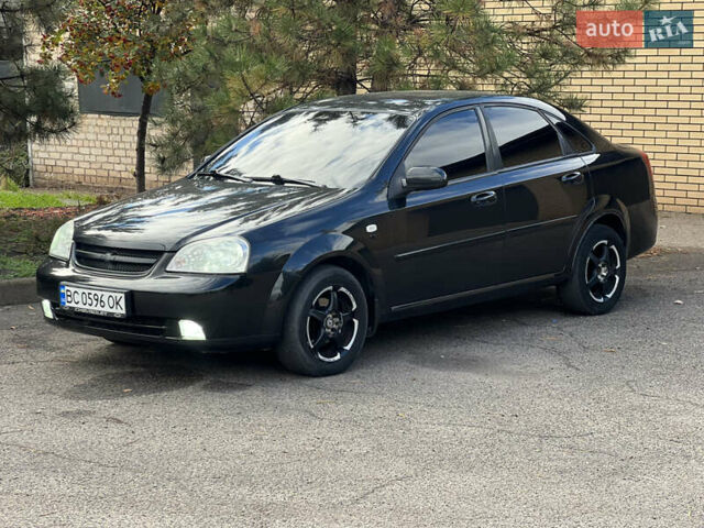 Черный Шевроле Лачетти, объемом двигателя 1.8 л и пробегом 248 тыс. км за 4250 $, фото 4 на Automoto.ua