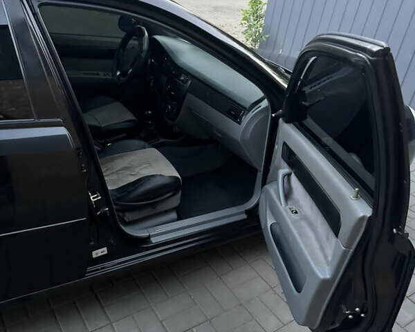 Черный Шевроле Лачетти, объемом двигателя 1.6 л и пробегом 195 тыс. км за 4850 $, фото 7 на Automoto.ua