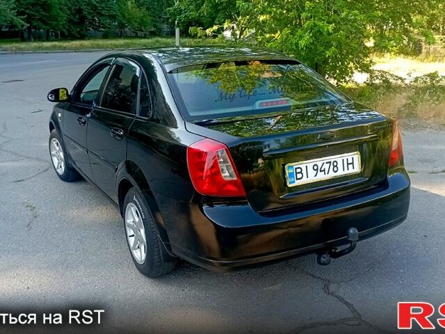 Черный Шевроле Лачетти, объемом двигателя 1.8 л и пробегом 260 тыс. км за 4400 $, фото 3 на Automoto.ua