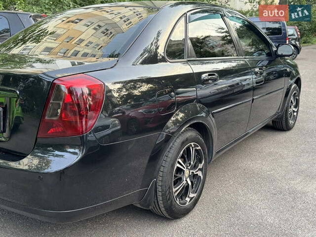 Черный Шевроле Лачетти, объемом двигателя 1.6 л и пробегом 252 тыс. км за 5700 $, фото 13 на Automoto.ua