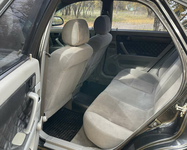 Черный Шевроле Лачетти, объемом двигателя 1.6 л и пробегом 240 тыс. км за 4300 $, фото 5 на Automoto.ua