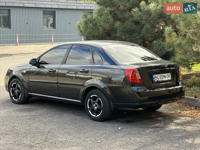 Черный Шевроле Лачетти, объемом двигателя 1.8 л и пробегом 248 тыс. км за 4250 $, фото 11 на Automoto.ua