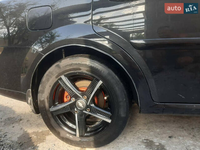 Черный Шевроле Лачетти, объемом двигателя 1.6 л и пробегом 215 тыс. км за 4000 $, фото 4 на Automoto.ua