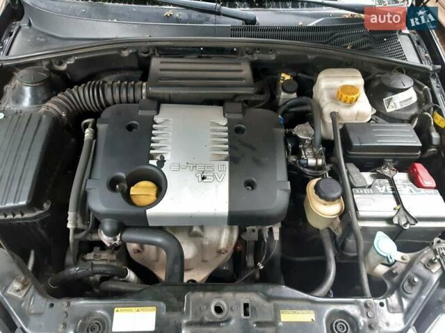 Черный Шевроле Лачетти, объемом двигателя 1.8 л и пробегом 274 тыс. км за 4900 $, фото 5 на Automoto.ua