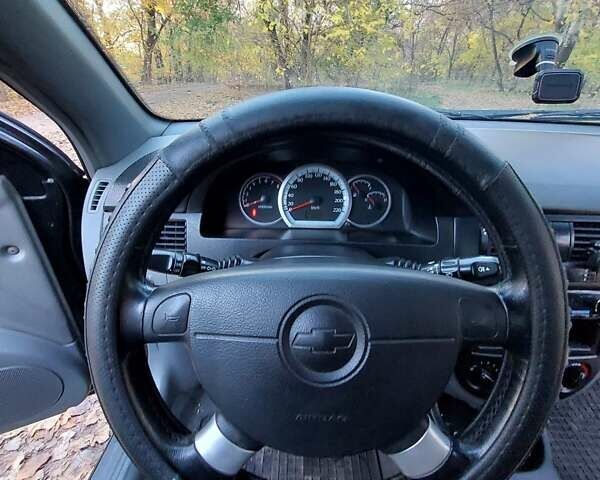 Черный Шевроле Лачетти, объемом двигателя 1.8 л и пробегом 210 тыс. км за 4200 $, фото 22 на Automoto.ua