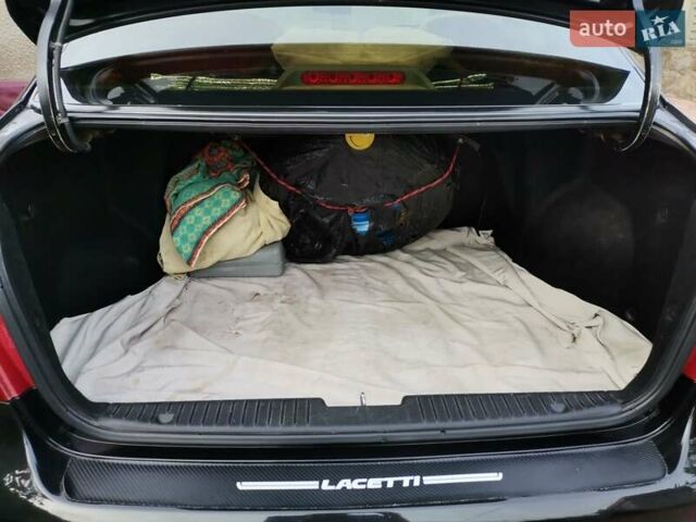 Черный Шевроле Лачетти, объемом двигателя 1.8 л и пробегом 270 тыс. км за 4600 $, фото 10 на Automoto.ua