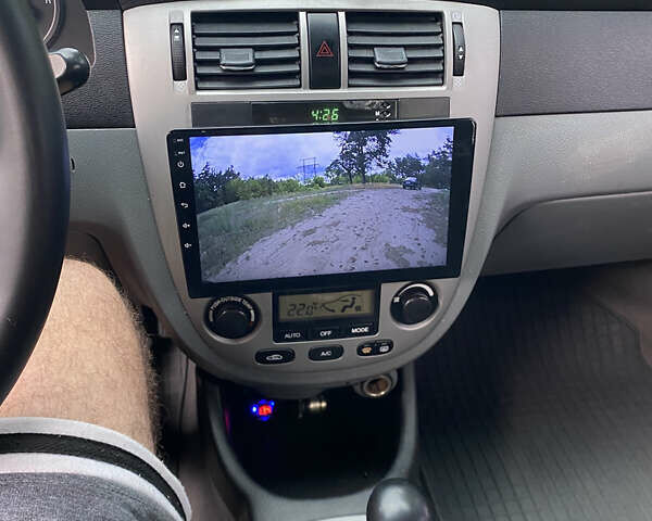 Чорний Шевроле Лачетті, об'ємом двигуна 1.8 л та пробігом 99 тис. км за 4800 $, фото 12 на Automoto.ua