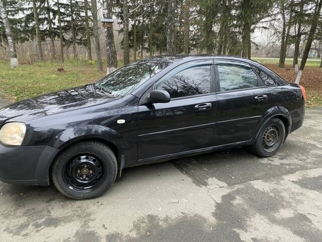 Черный Шевроле Лачетти, объемом двигателя 1.6 л и пробегом 264 тыс. км за 1999 $, фото 13 на Automoto.ua