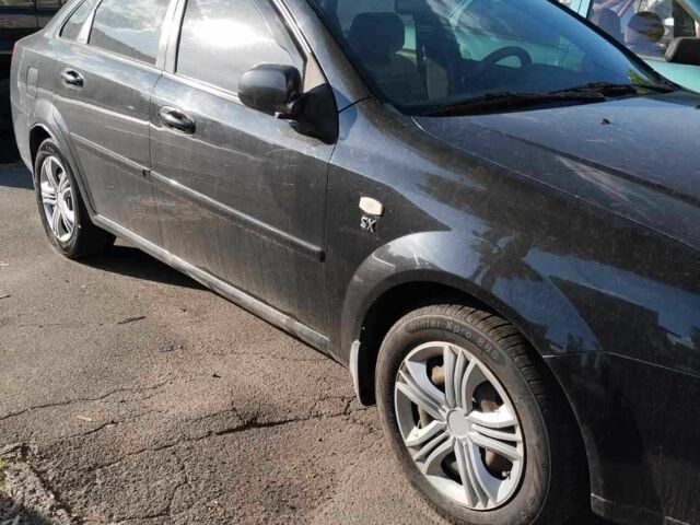 Черный Шевроле Лачетти, объемом двигателя 1.8 л и пробегом 367 тыс. км за 3500 $, фото 4 на Automoto.ua