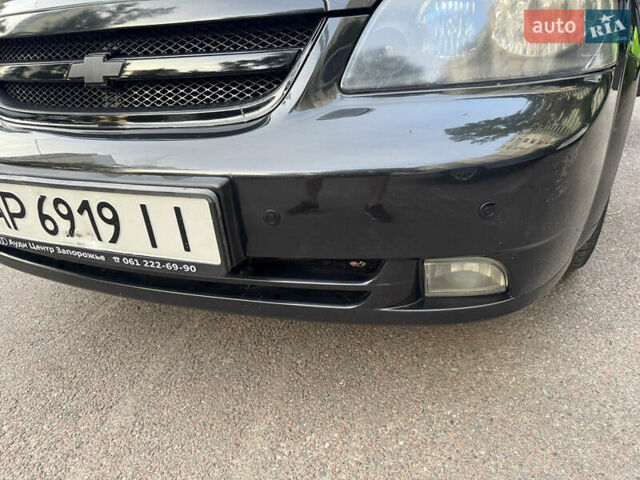 Черный Шевроле Лачетти, объемом двигателя 1.6 л и пробегом 252 тыс. км за 5700 $, фото 2 на Automoto.ua
