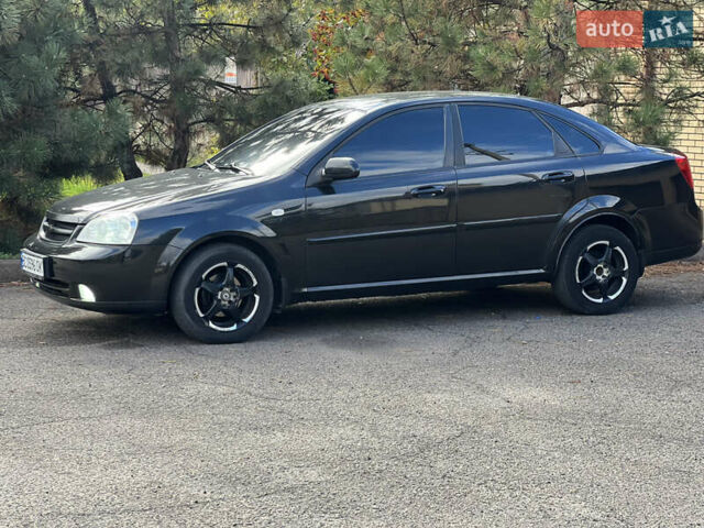 Черный Шевроле Лачетти, объемом двигателя 1.8 л и пробегом 248 тыс. км за 4250 $, фото 7 на Automoto.ua