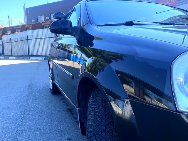 Черный Шевроле Лачетти, объемом двигателя 1.8 л и пробегом 293 тыс. км за 4200 $, фото 1 на Automoto.ua