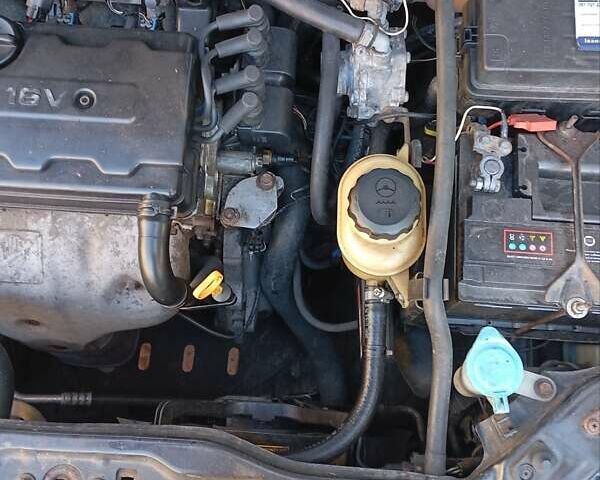 Черный Шевроле Лачетти, объемом двигателя 1.8 л и пробегом 282 тыс. км за 3500 $, фото 10 на Automoto.ua