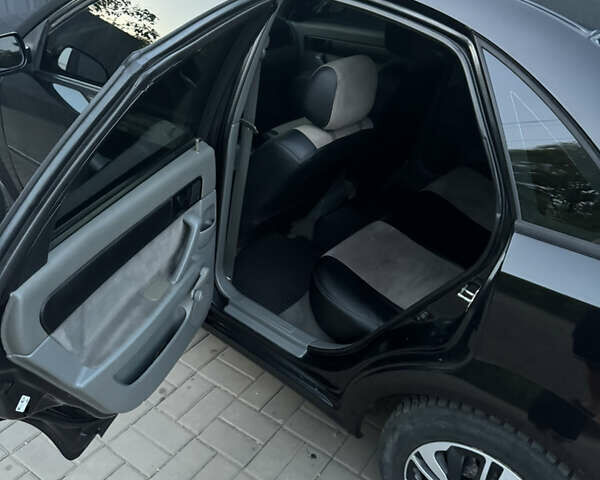 Черный Шевроле Лачетти, объемом двигателя 1.6 л и пробегом 195 тыс. км за 4850 $, фото 6 на Automoto.ua