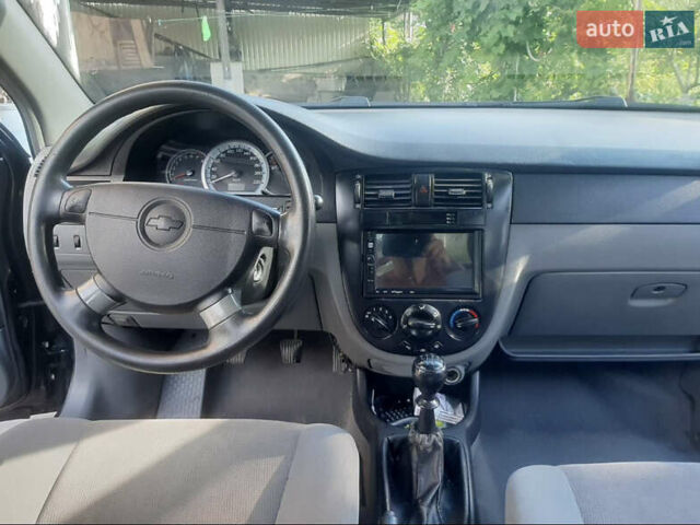 Черный Шевроле Лачетти, объемом двигателя 1.6 л и пробегом 215 тыс. км за 4000 $, фото 11 на Automoto.ua