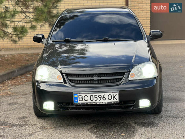 Черный Шевроле Лачетти, объемом двигателя 1.8 л и пробегом 248 тыс. км за 4250 $, фото 2 на Automoto.ua