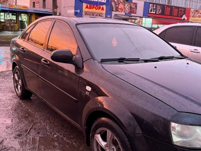 Черный Шевроле Лачетти, объемом двигателя 1.8 л и пробегом 358 тыс. км за 3600 $, фото 1 на Automoto.ua