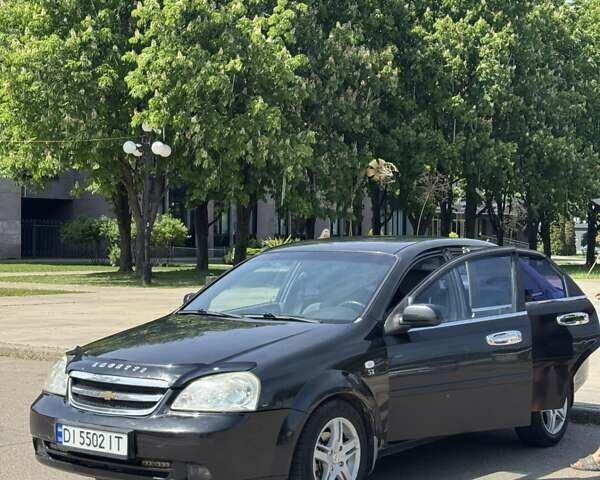 Черный Шевроле Лачетти, объемом двигателя 1.8 л и пробегом 194 тыс. км за 3700 $, фото 1 на Automoto.ua