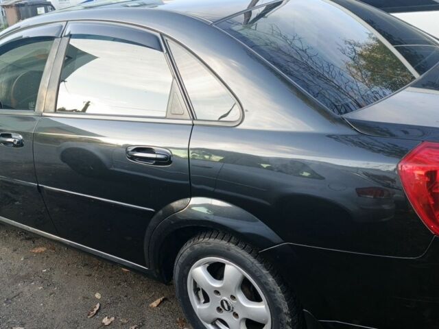 Чорний Шевроле Лачетті, об'ємом двигуна 1.6 л та пробігом 235 тис. км за 3495 $, фото 12 на Automoto.ua