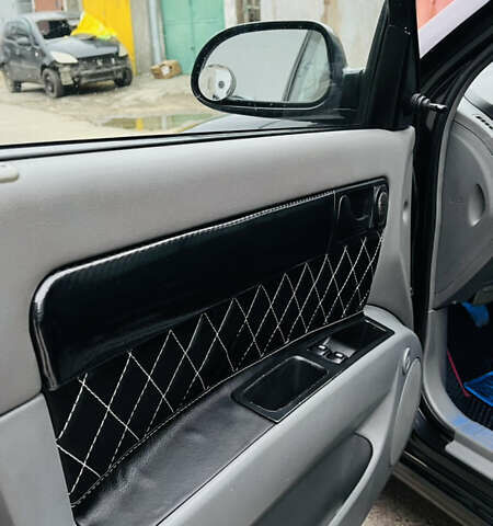 Черный Шевроле Лачетти, объемом двигателя 1.6 л и пробегом 218 тыс. км за 4800 $, фото 18 на Automoto.ua