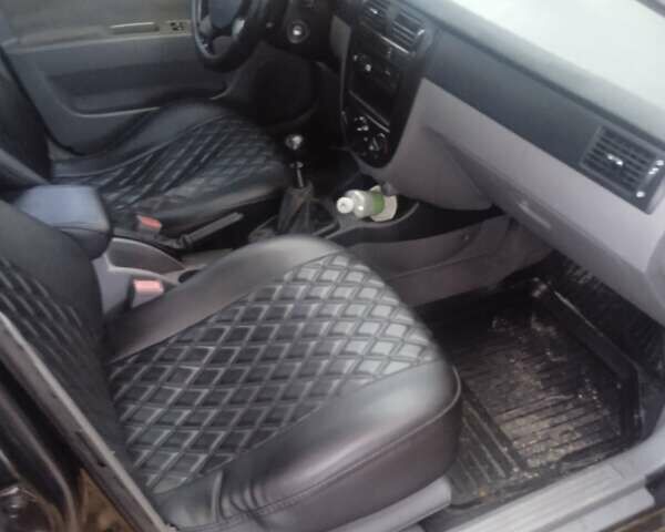 Чорний Шевроле Лачетті, об'ємом двигуна 1.8 л та пробігом 300 тис. км за 3500 $, фото 10 на Automoto.ua