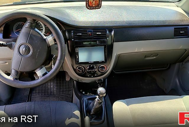 Черный Шевроле Лачетти, объемом двигателя 1.8 л и пробегом 345 тыс. км за 2200 $, фото 3 на Automoto.ua