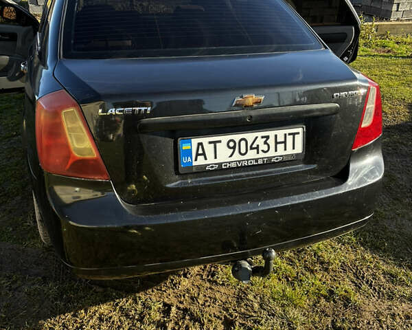 Чорний Шевроле Лачетті, об'ємом двигуна 1.8 л та пробігом 231 тис. км за 4000 $, фото 6 на Automoto.ua