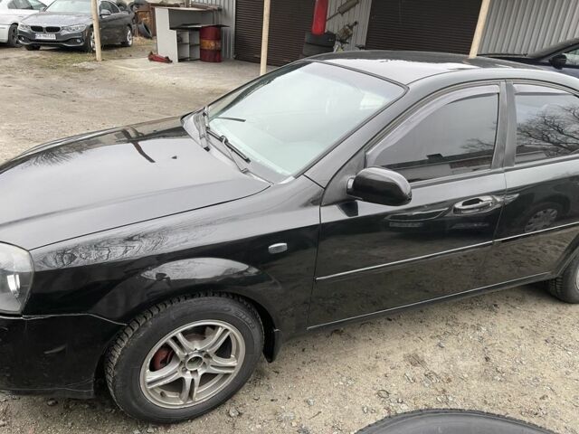 Черный Шевроле Лачетти, объемом двигателя 1.8 л и пробегом 265 тыс. км за 2400 $, фото 1 на Automoto.ua