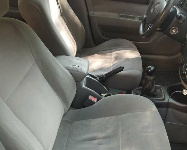 Черный Шевроле Лачетти, объемом двигателя 1.6 л и пробегом 400 тыс. км за 4000 $, фото 3 на Automoto.ua