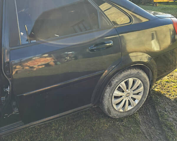 Чорний Шевроле Лачетті, об'ємом двигуна 1.8 л та пробігом 231 тис. км за 4000 $, фото 5 на Automoto.ua