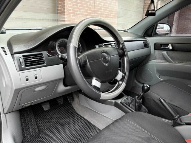 Черный Шевроле Лачетти, объемом двигателя 1.8 л и пробегом 204 тыс. км за 4300 $, фото 12 на Automoto.ua