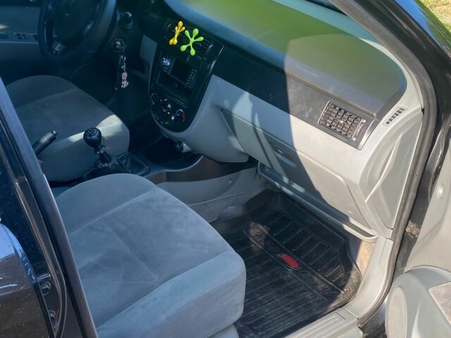 Черный Шевроле Лачетти, объемом двигателя 1.8 л и пробегом 270 тыс. км за 3500 $, фото 5 на Automoto.ua