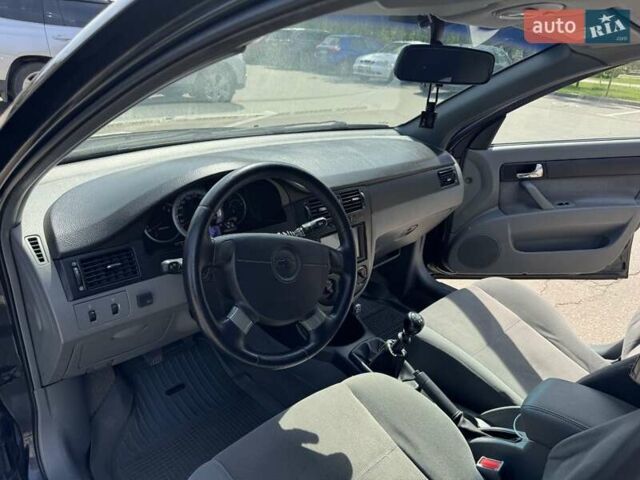 Черный Шевроле Лачетти, объемом двигателя 1.8 л и пробегом 194 тыс. км за 3700 $, фото 7 на Automoto.ua