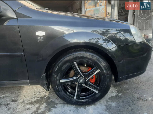 Черный Шевроле Лачетти, объемом двигателя 1.6 л и пробегом 215 тыс. км за 4000 $, фото 3 на Automoto.ua