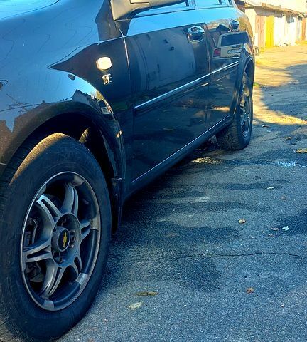 Чорний Шевроле Лачетті, об'ємом двигуна 1.6 л та пробігом 242 тис. км за 4600 $, фото 1 на Automoto.ua