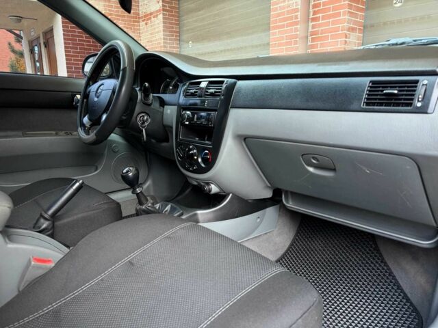 Черный Шевроле Лачетти, объемом двигателя 1.8 л и пробегом 204 тыс. км за 4300 $, фото 15 на Automoto.ua