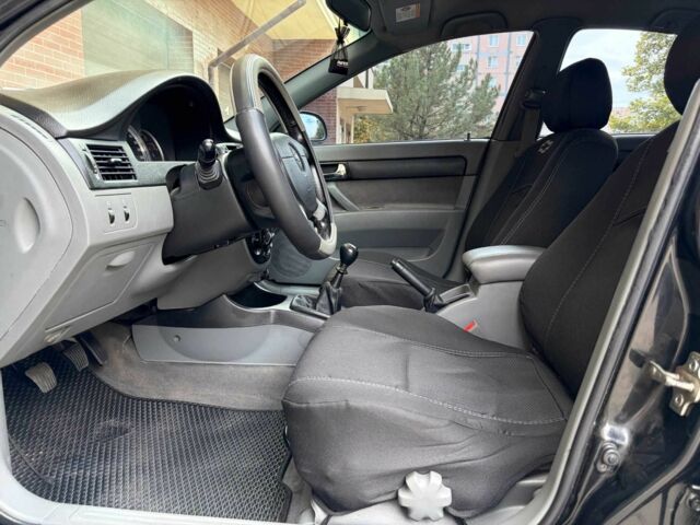 Черный Шевроле Лачетти, объемом двигателя 1.8 л и пробегом 204 тыс. км за 4300 $, фото 11 на Automoto.ua