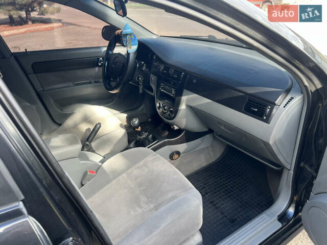 Черный Шевроле Лачетти, объемом двигателя 1.8 л и пробегом 248 тыс. км за 4250 $, фото 21 на Automoto.ua