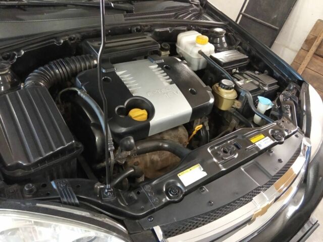 Черный Шевроле Лачетти, объемом двигателя 1.8 л и пробегом 204 тыс. км за 4450 $, фото 12 на Automoto.ua