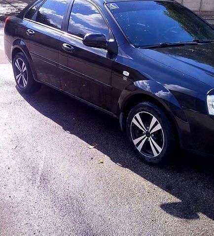 Черный Шевроле Лачетти, объемом двигателя 1.8 л и пробегом 188 тыс. км за 4900 $, фото 5 на Automoto.ua