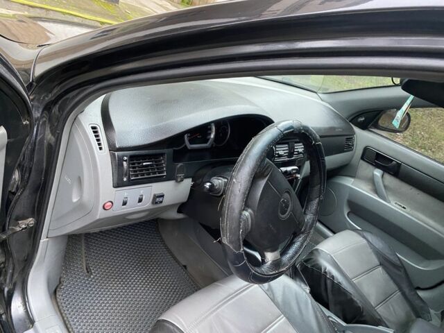 Черный Шевроле Лачетти, объемом двигателя 1.6 л и пробегом 264 тыс. км за 1999 $, фото 2 на Automoto.ua