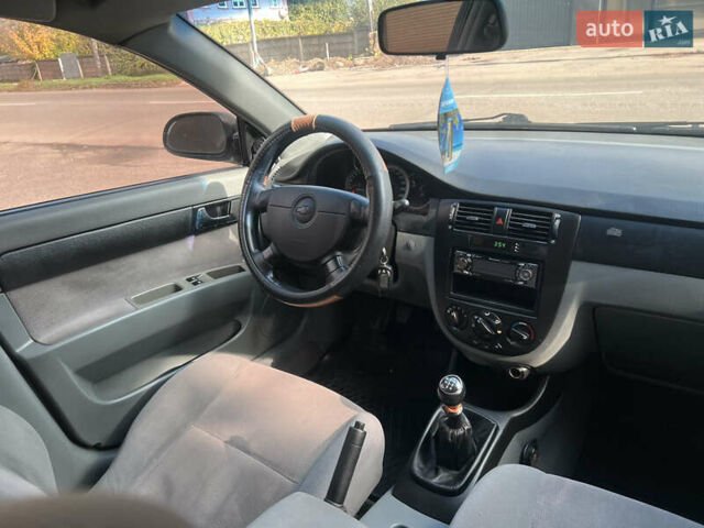 Черный Шевроле Лачетти, объемом двигателя 1.8 л и пробегом 248 тыс. км за 4250 $, фото 23 на Automoto.ua