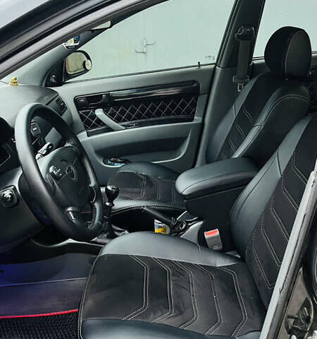 Черный Шевроле Лачетти, объемом двигателя 1.6 л и пробегом 218 тыс. км за 4800 $, фото 22 на Automoto.ua