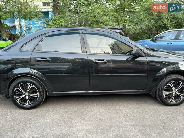 Черный Шевроле Лачетти, объемом двигателя 1.6 л и пробегом 252 тыс. км за 5700 $, фото 11 на Automoto.ua