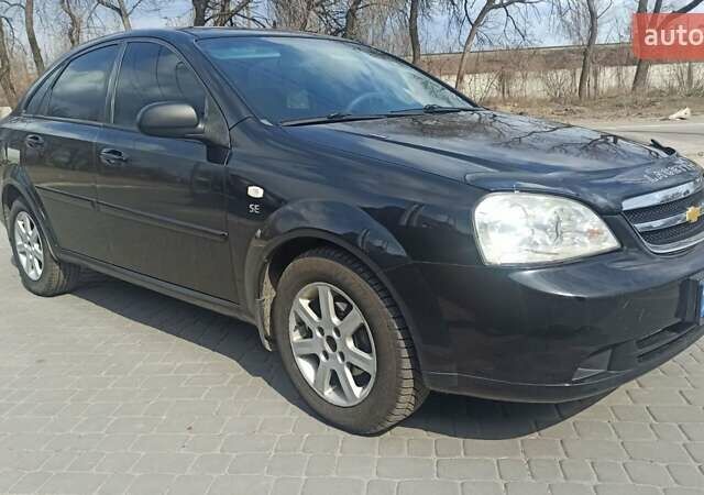 Черный Шевроле Лачетти, объемом двигателя 1.6 л и пробегом 280 тыс. км за 3850 $, фото 2 на Automoto.ua