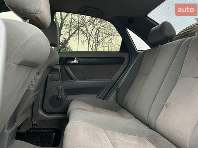 Черный Шевроле Лачетти, объемом двигателя 1.8 л и пробегом 237 тыс. км за 3600 $, фото 17 на Automoto.ua