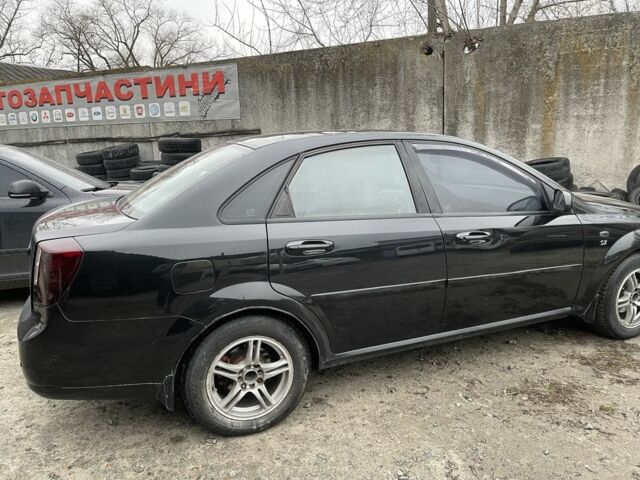 Черный Шевроле Лачетти, объемом двигателя 1.8 л и пробегом 265 тыс. км за 2400 $, фото 3 на Automoto.ua