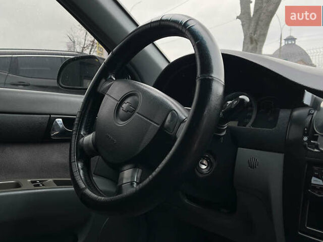 Черный Шевроле Лачетти, объемом двигателя 1.8 л и пробегом 237 тыс. км за 3600 $, фото 15 на Automoto.ua