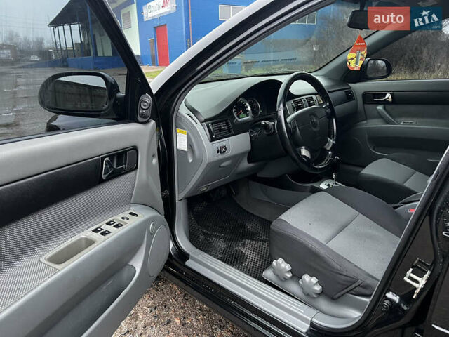 Черный Шевроле Лачетти, объемом двигателя 1.8 л и пробегом 243 тыс. км за 4489 $, фото 9 на Automoto.ua