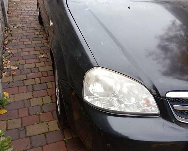 Черный Шевроле Лачетти, объемом двигателя 1.8 л и пробегом 282 тыс. км за 3500 $, фото 1 на Automoto.ua